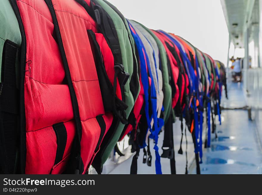 Many of lifejacket are hanging on the cruise, Phuket. Many of lifejacket are hanging on the cruise, Phuket