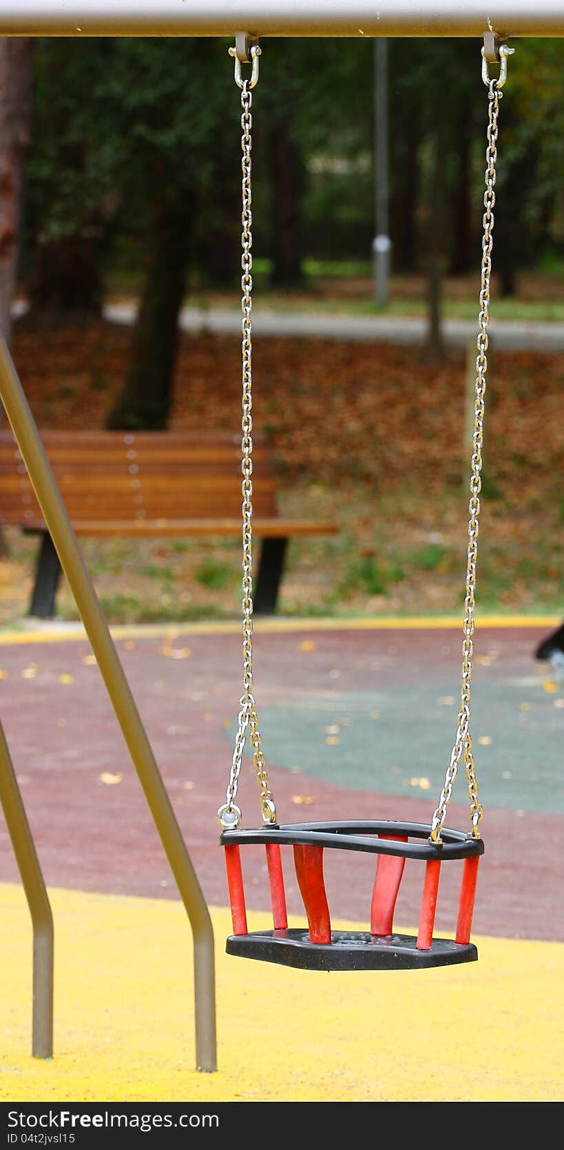 Empty swing on children playground