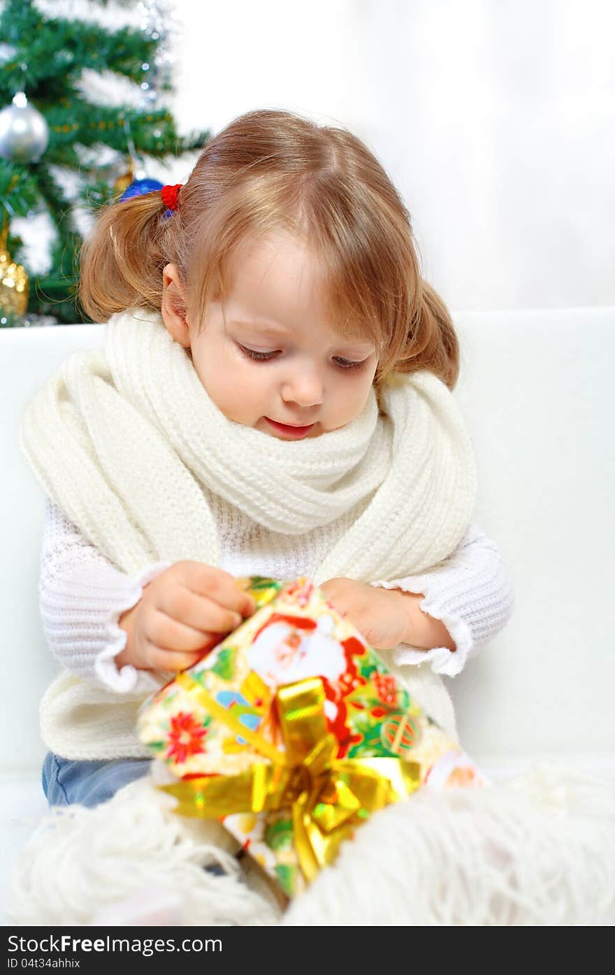 Girl Holding A Christmas Gift