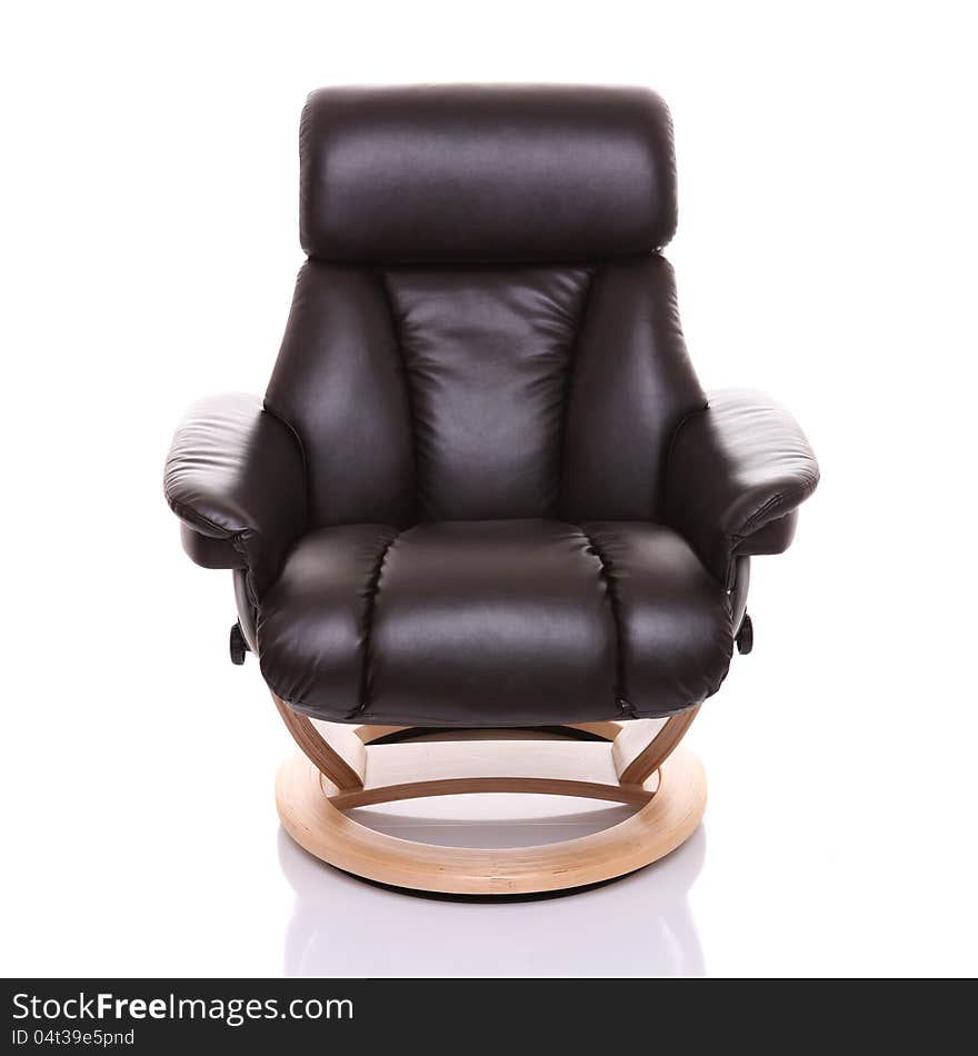 A chocolate coloured leather recliner chair with light wooden base, shown face on in fully upright position. on white with reflected shadow. A chocolate coloured leather recliner chair with light wooden base, shown face on in fully upright position. on white with reflected shadow.