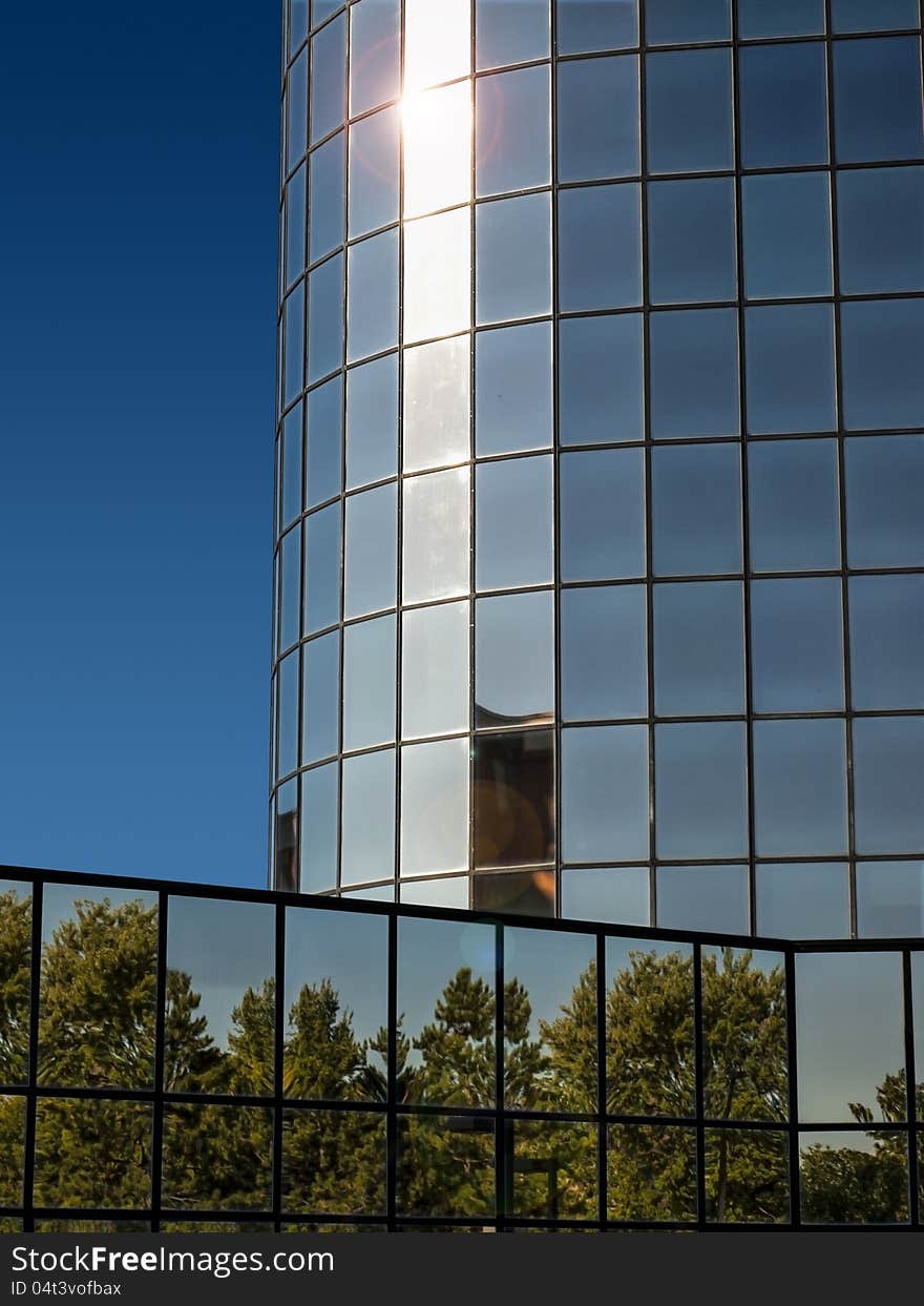 Modern bussines building with clear blue sky in the background. Modern bussines building with clear blue sky in the background