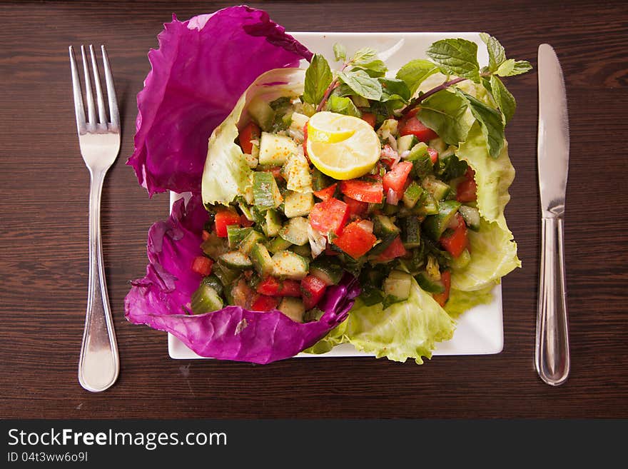 Salad with mixed lettuce, ham, olives, Lemon, avocado, cherry tomatoes, and a creamy dressing. Salad with mixed lettuce, ham, olives, Lemon, avocado, cherry tomatoes, and a creamy dressing.