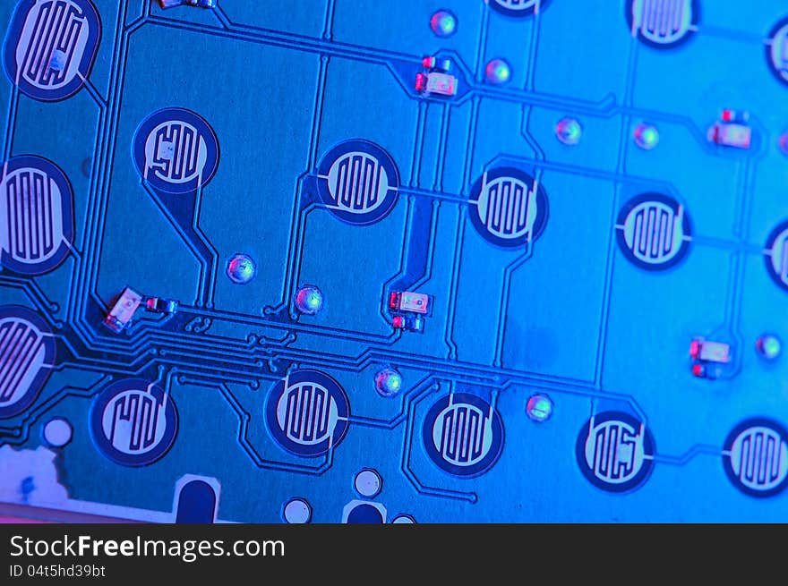 A close-up of blue mobile phone circuit board. A close-up of blue mobile phone circuit board