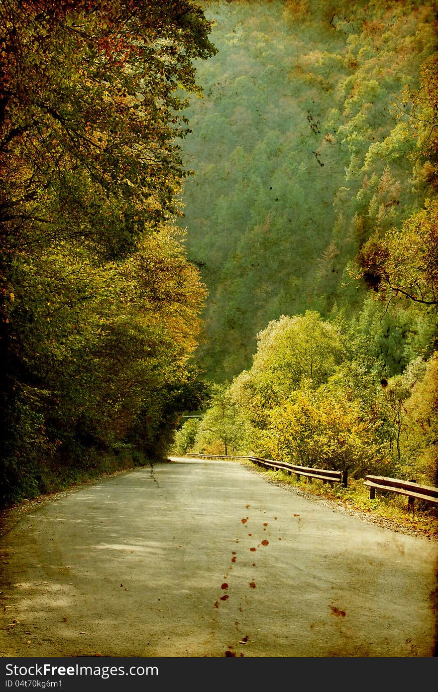 Vintage photo of curving road in autumn forest. Vintage photo of curving road in autumn forest