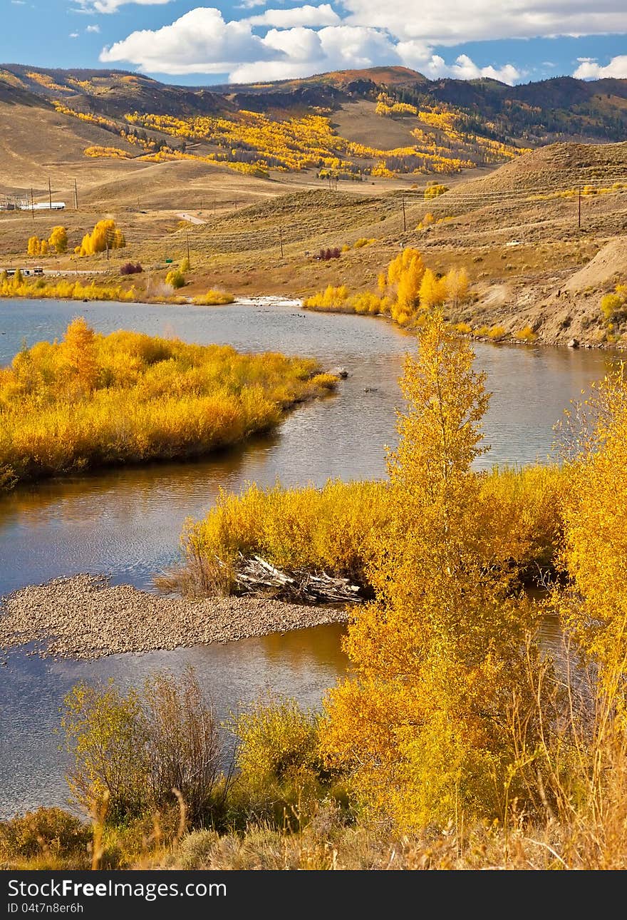 Golden yellow landscape with rivers and moutainside views in Colorado. Golden yellow landscape with rivers and moutainside views in Colorado