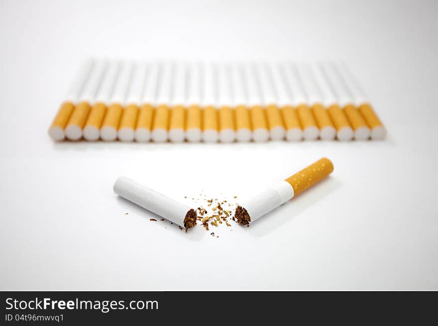 Cigarettes is not good for healthy that is photo idea and photo cigarettes on white background