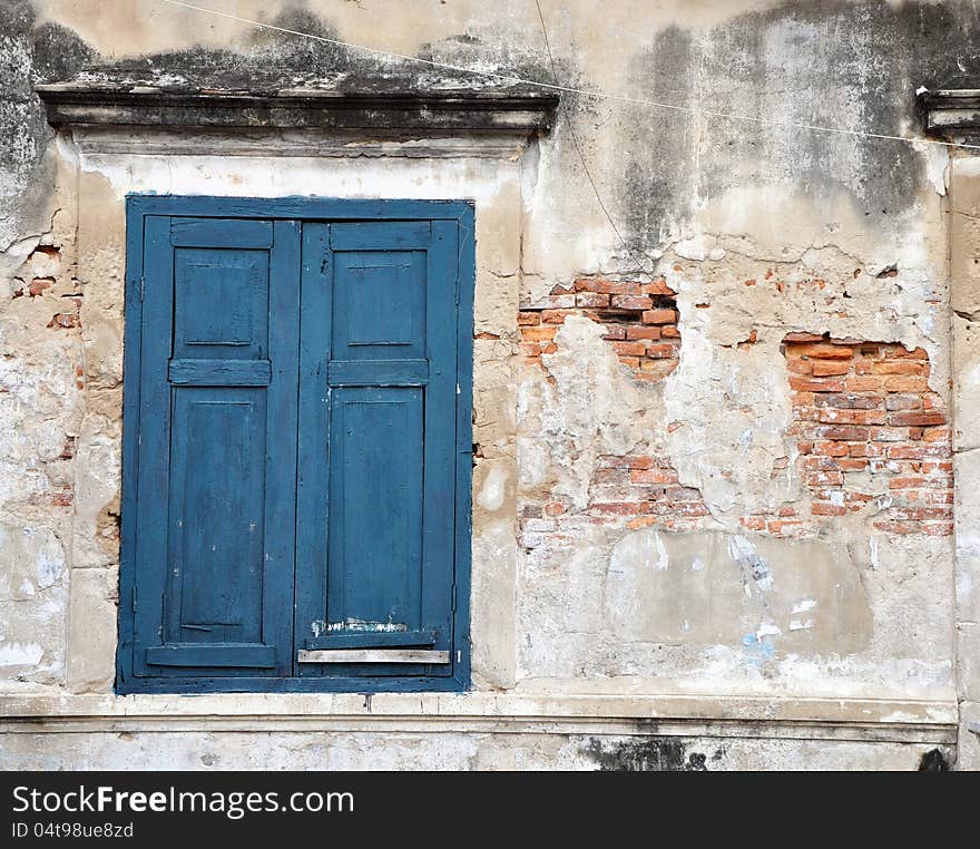 Exterior with rural window on brick wall