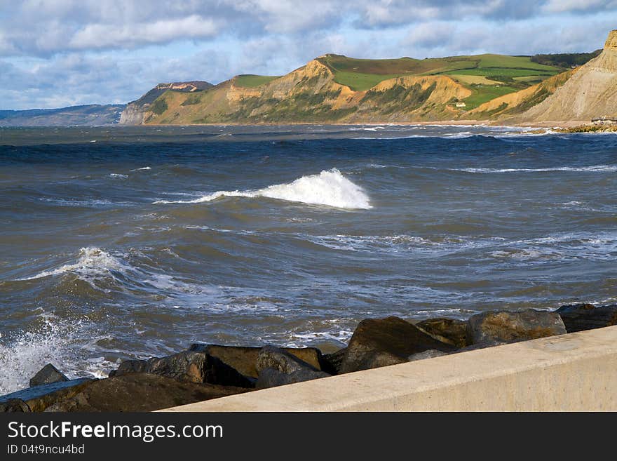 Dorset coastline from West Bay harbour wall