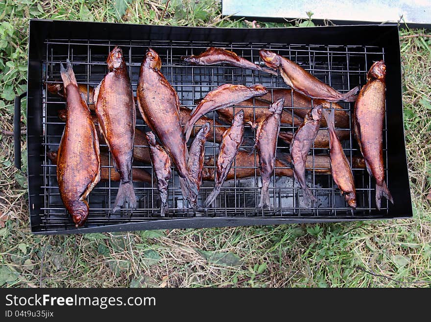 Fish of the mountain river prepared on a smoke. Fish of the mountain river prepared on a smoke