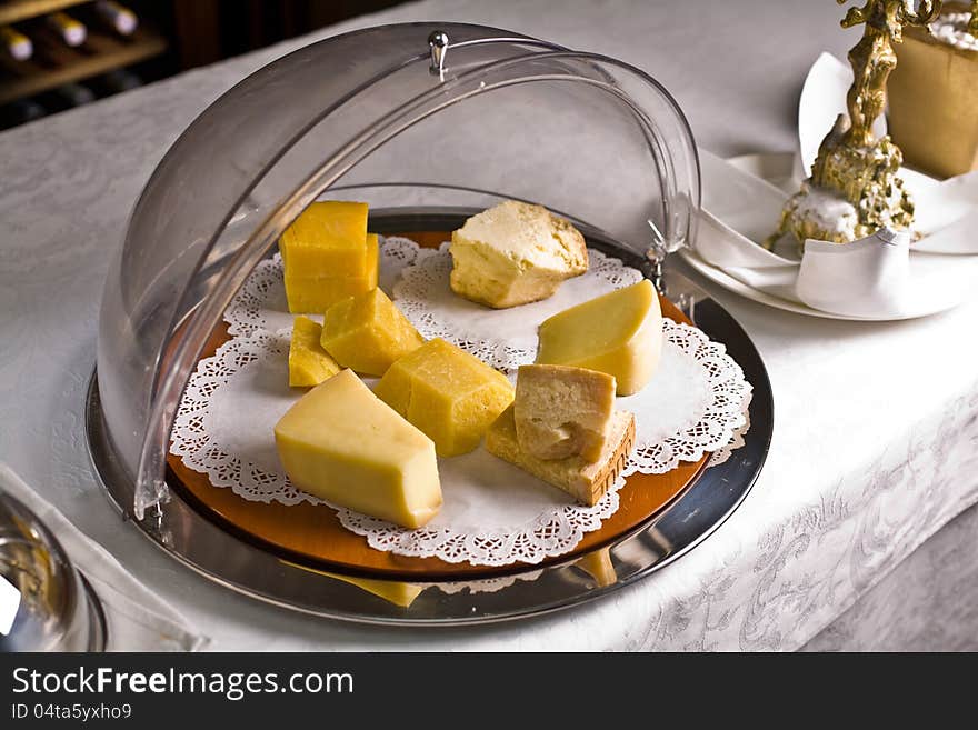 Variety of cheeses on the table the vintage restaurant. Variety of cheeses on the table the vintage restaurant.