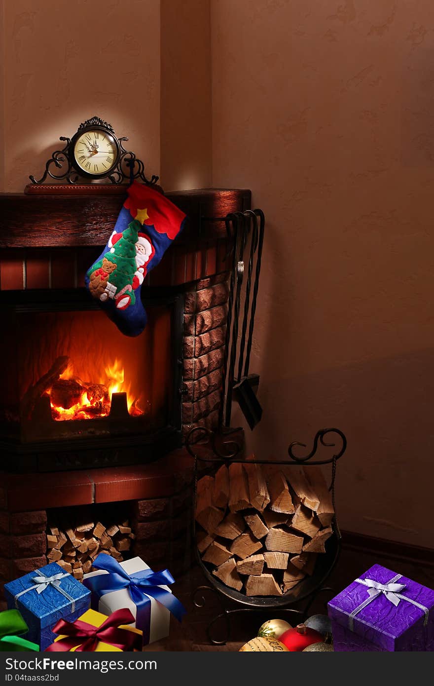 Christmas gifts by the fireplace. Christmas gifts by the fireplace.