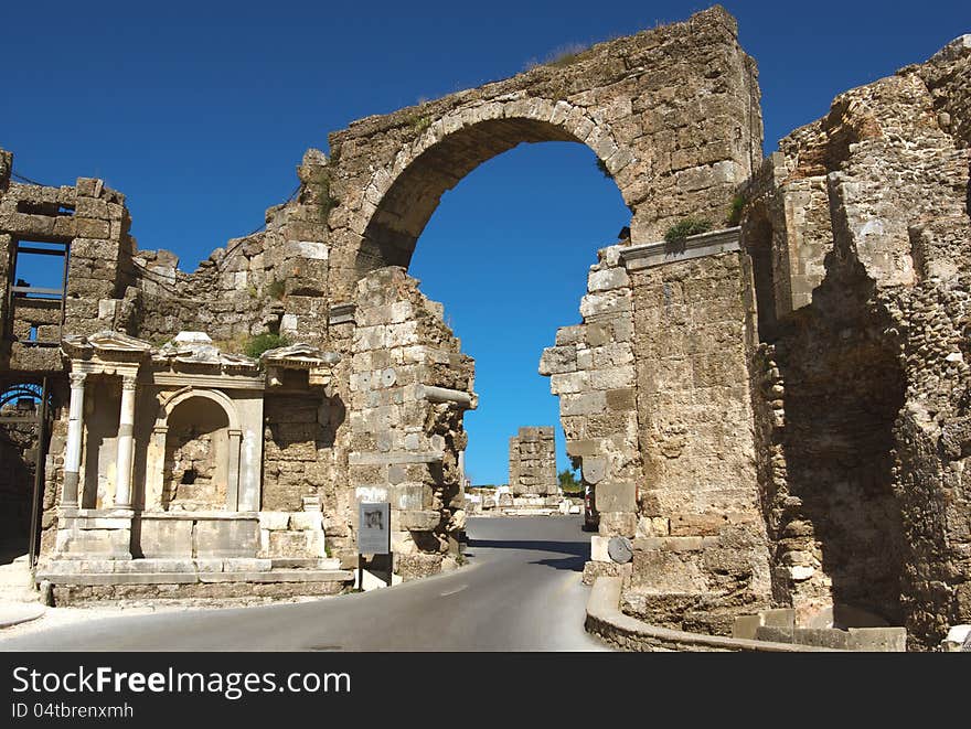 Road and ancient ruins in Side, Turkey