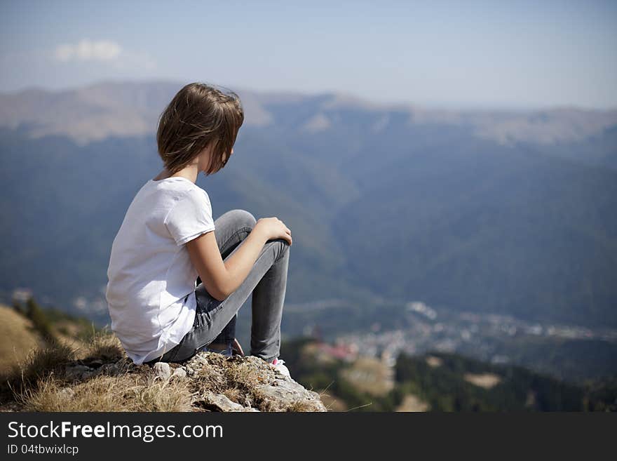 Teenager woman admiring mountain