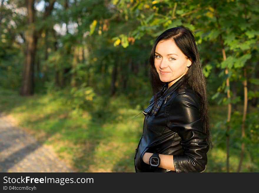 Happy woman in woodland