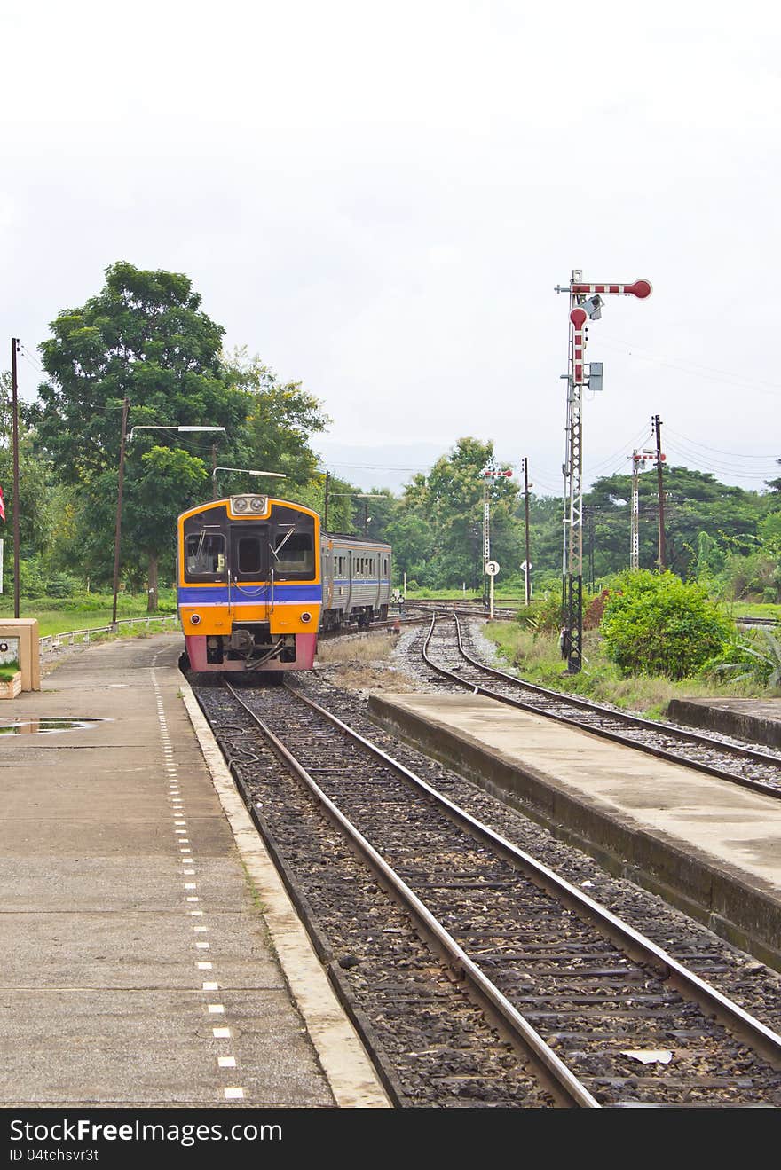 Last of the yellow train car at the station. Last of the yellow train car at the station