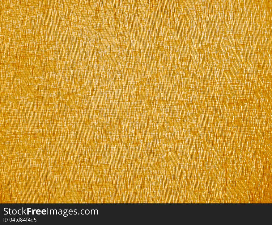 The image of brown background like a fabric. The image of brown background like a fabric