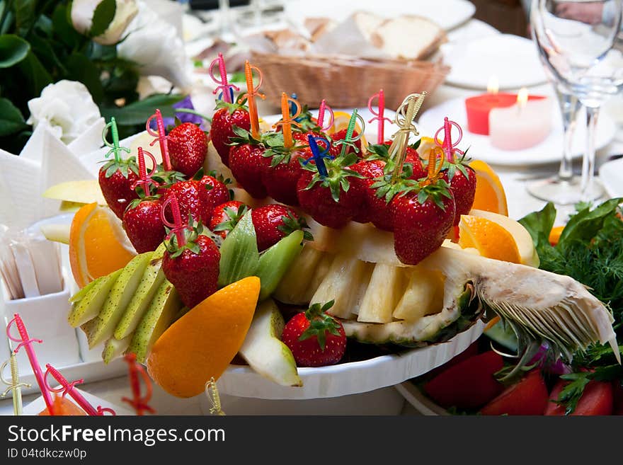 Fruit plate with pineapple on restaurant table. Fruit plate with pineapple on restaurant table