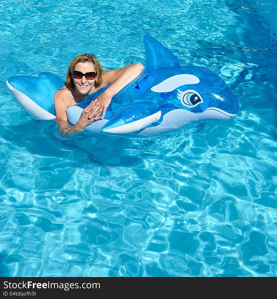 Beautiful Woman In A Swimming Pool