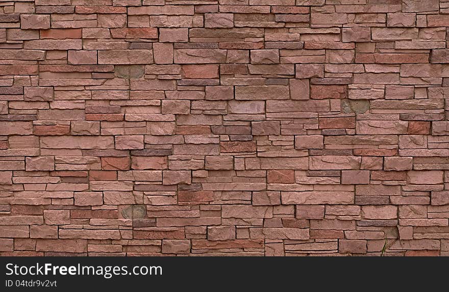 Pink brick wall pattern. May be used as background or texture. Pink brick wall pattern. May be used as background or texture