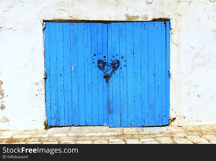 Very ancient blue Tunisan doorway. Very ancient blue Tunisan doorway