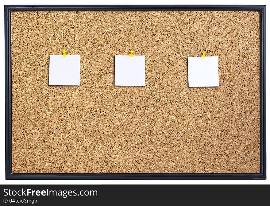 Cork board with three pieces of paper pinned. Cork board with three pieces of paper pinned.