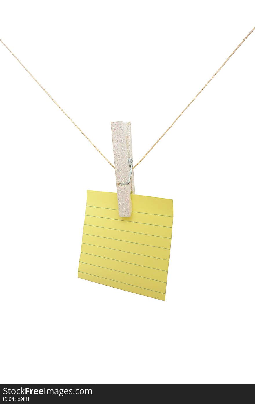 Yellow lined post-it note on a string on a white isolated background. Yellow lined post-it note on a string on a white isolated background