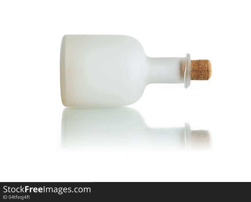 Empty glass bottle lying on white background. with clipping path. Empty glass bottle lying on white background. with clipping path