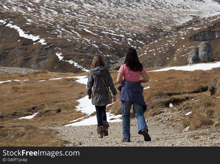 Two tourists visiting mountains