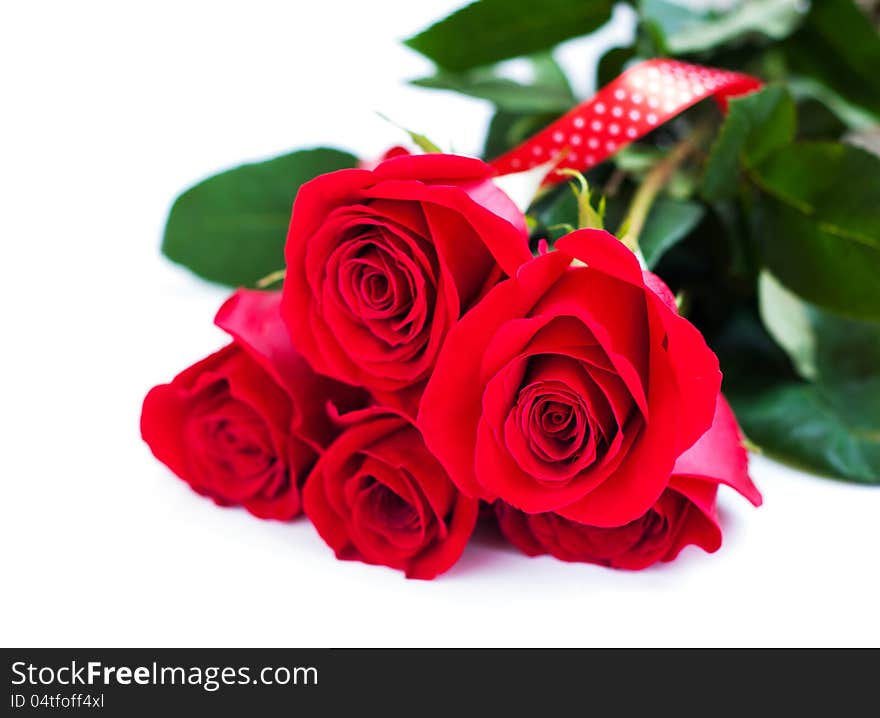 Bouquet of red roses on a white background