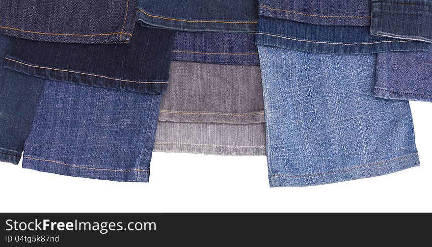 Isolates of leg jeans from the garment, which overlap in many of thirteen pieces. Isolates of leg jeans from the garment, which overlap in many of thirteen pieces.