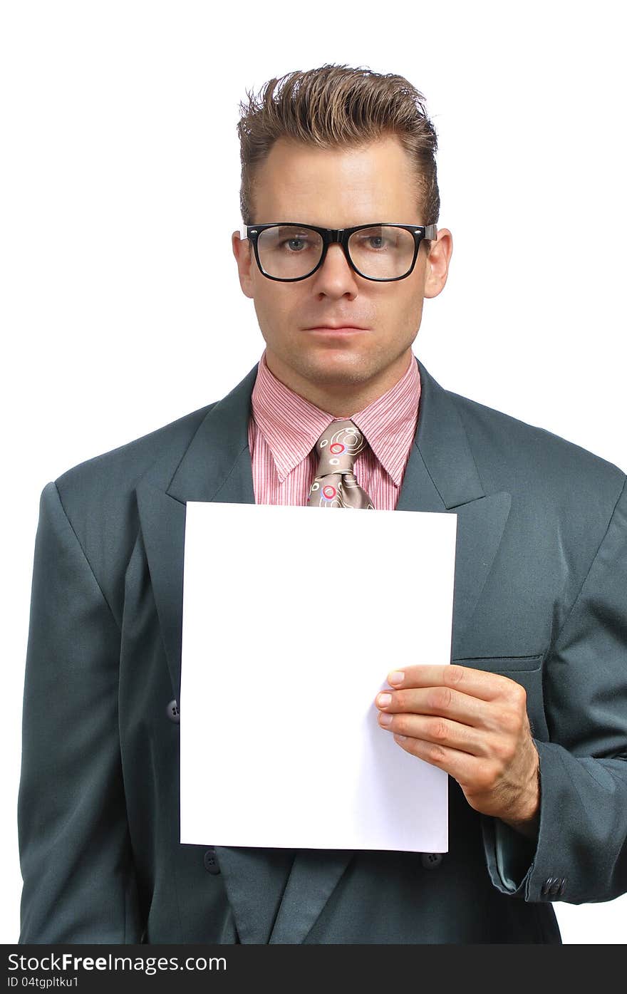 Caucasian businessman with glasses in fashionable suit holds blank paper with copy space on white background. Caucasian businessman with glasses in fashionable suit holds blank paper with copy space on white background