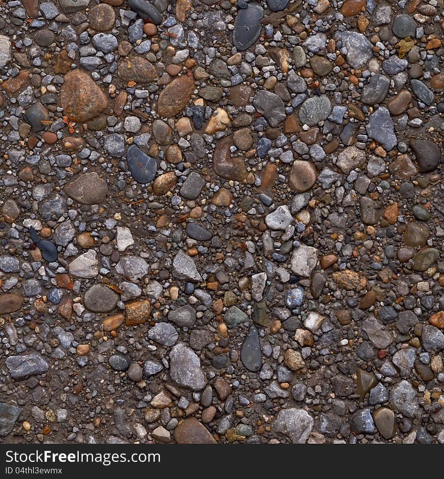 Roundish pebble stone gravel texture or background. Roundish pebble stone gravel texture or background