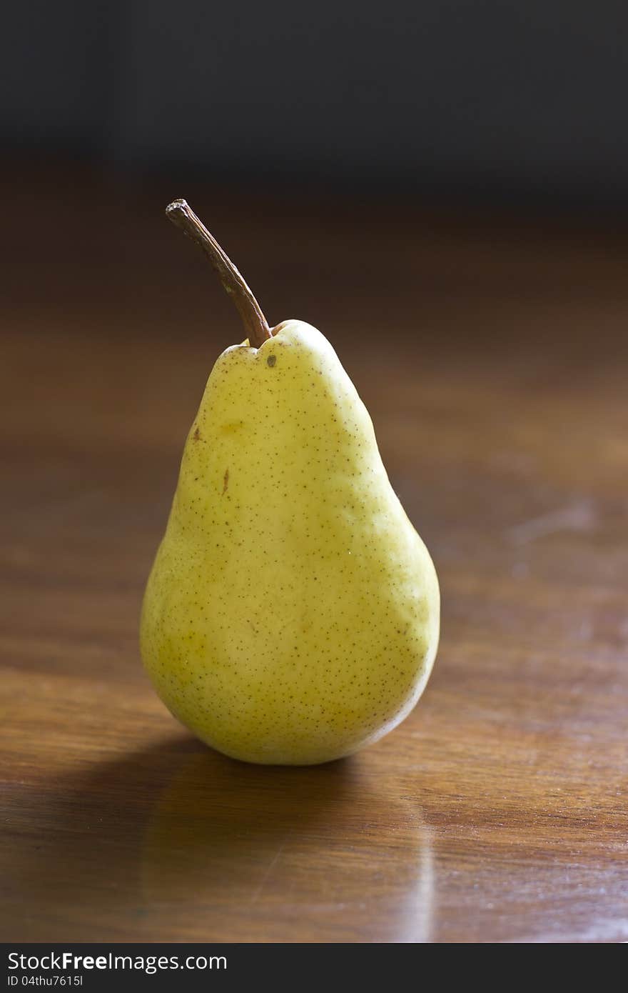 Pear on the wood background