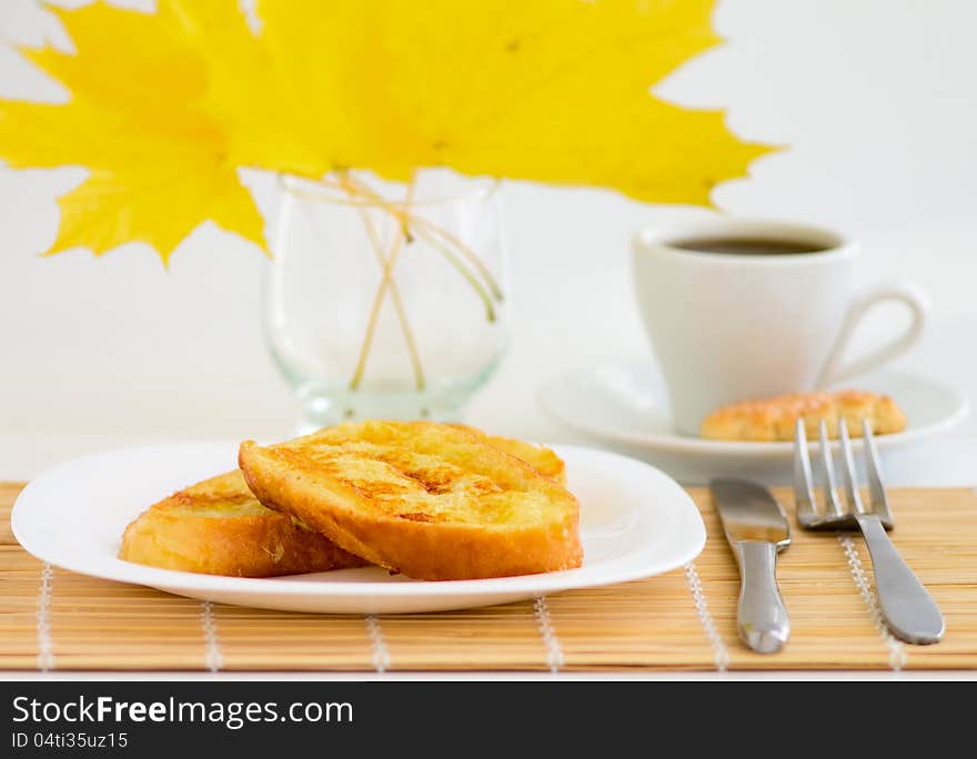 Cup Of Coffee And Sweet Toast On Bamboo Table