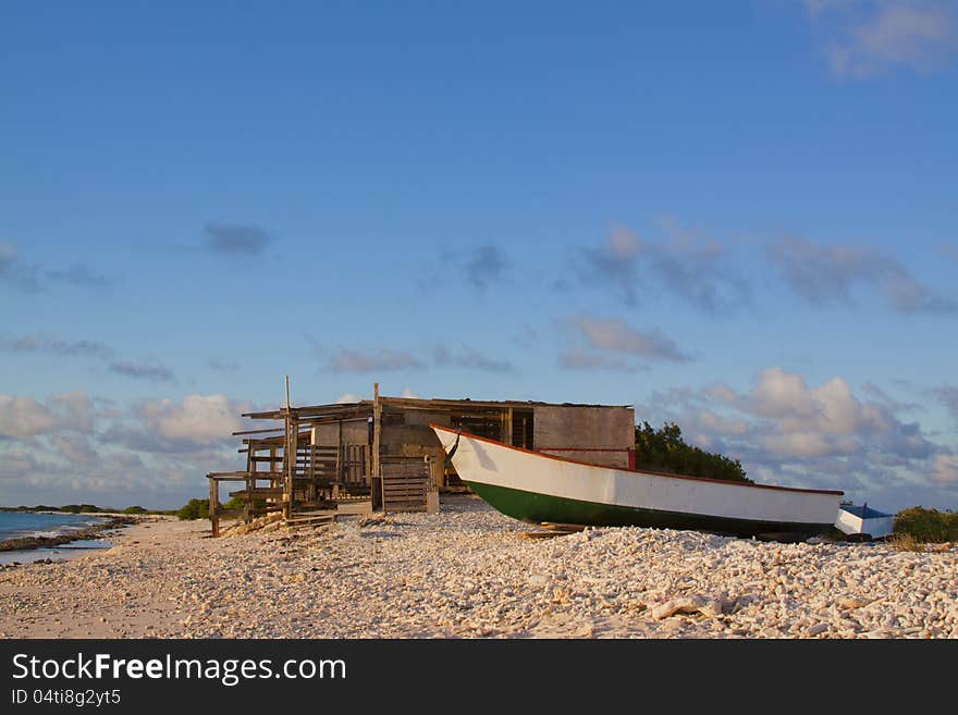 Shack on Beach with Boat