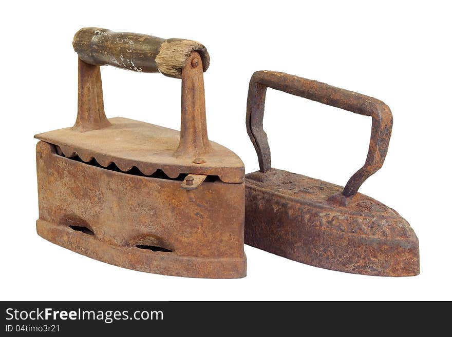 Two old metal iron on a white background. Two old metal iron on a white background