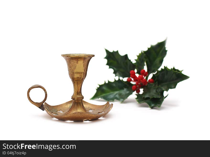 Vintage candlestick with holly berry