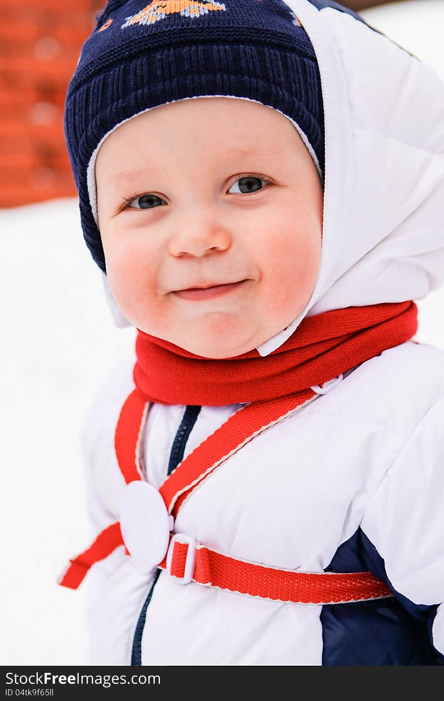 Portrait of happy baby in winter outdoors. Portrait of happy baby in winter outdoors