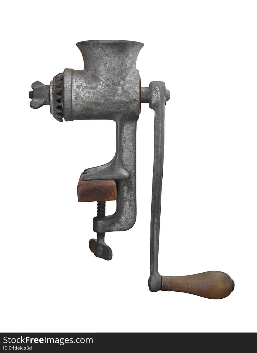 Vintage hand cranked gray metal meat grinder. Isolated on white. Vintage hand cranked gray metal meat grinder. Isolated on white.