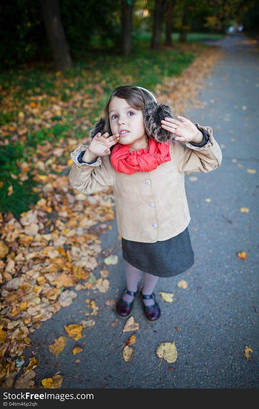 Small Girl Outdoor In The Park Looking Up