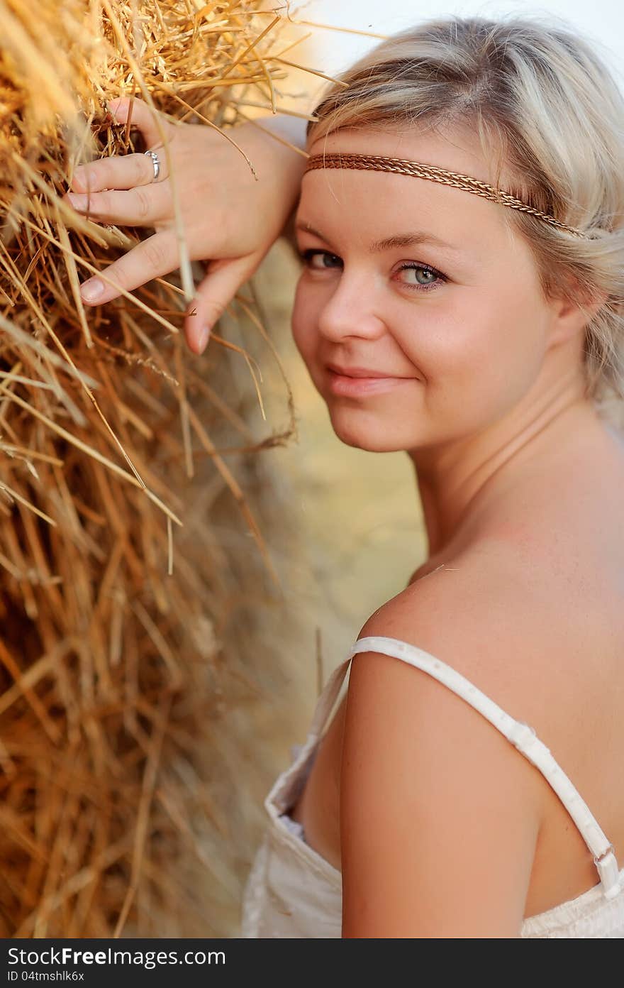 Woman In The Hay