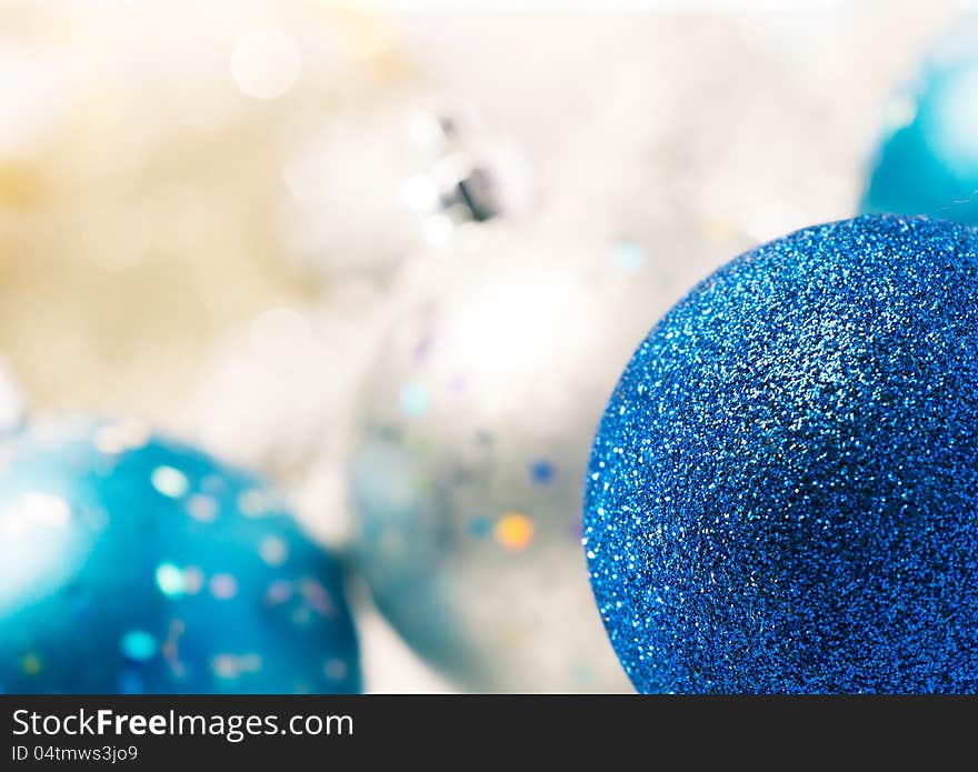 Christmas background with blue and silver ornaments