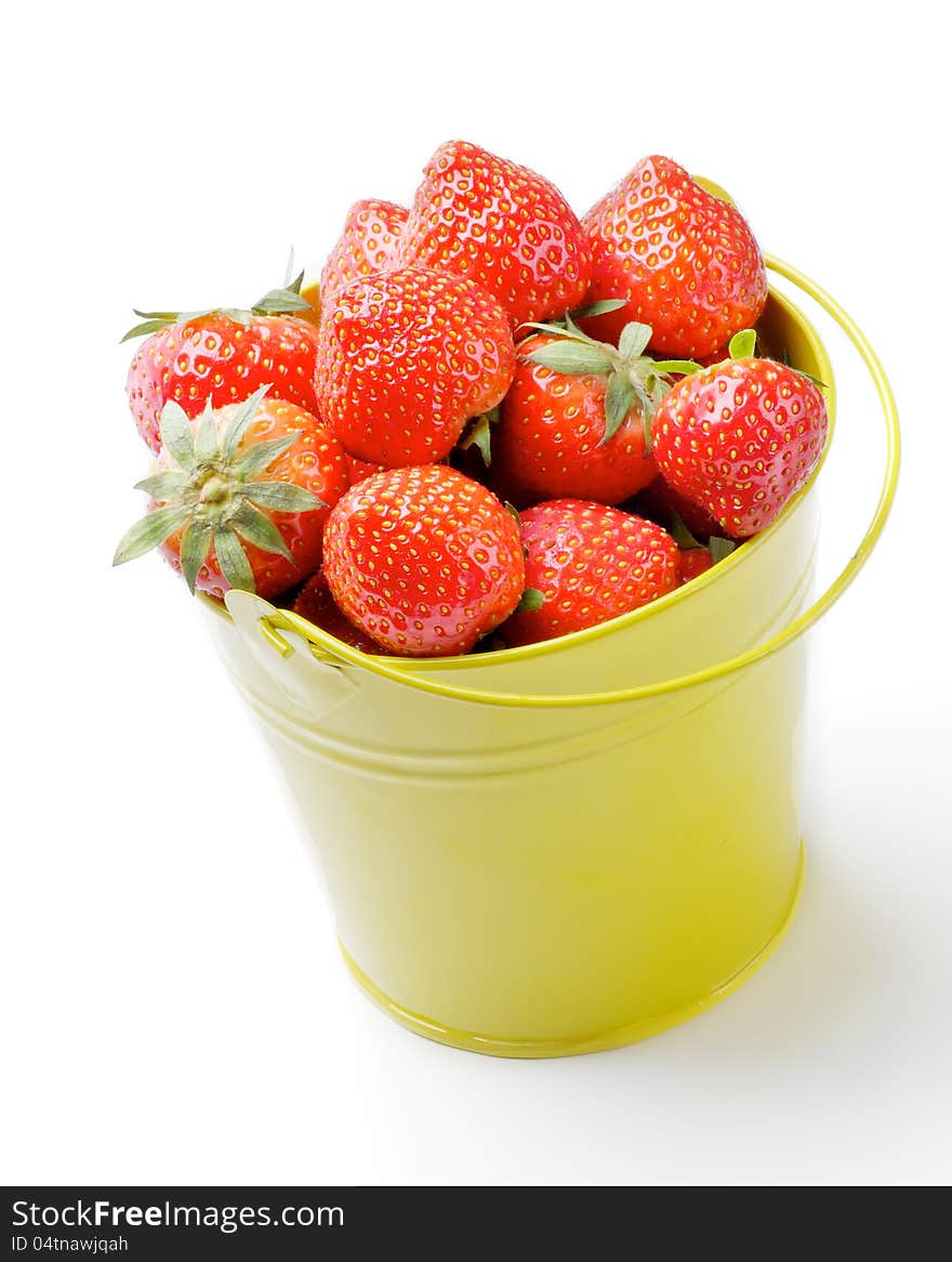 Strawberries inside Yellow Bucket