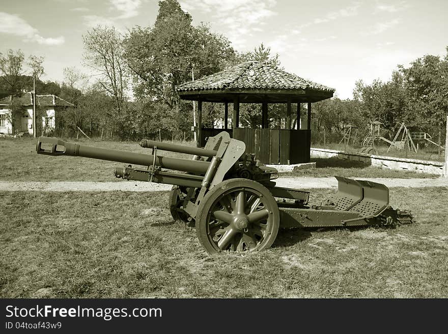 Old artillery cannon war in the center of the Bulgarian village Chakali. Old artillery cannon war in the center of the Bulgarian village Chakali