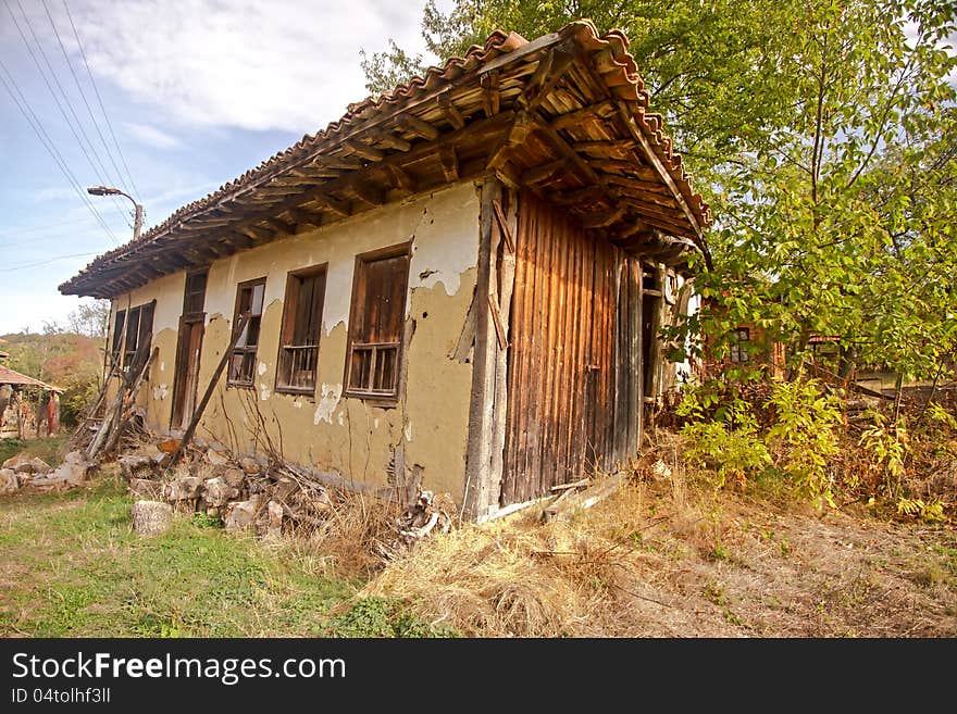 Abandoned wooden house in the mountain village. Abandoned wooden house in the mountain village.