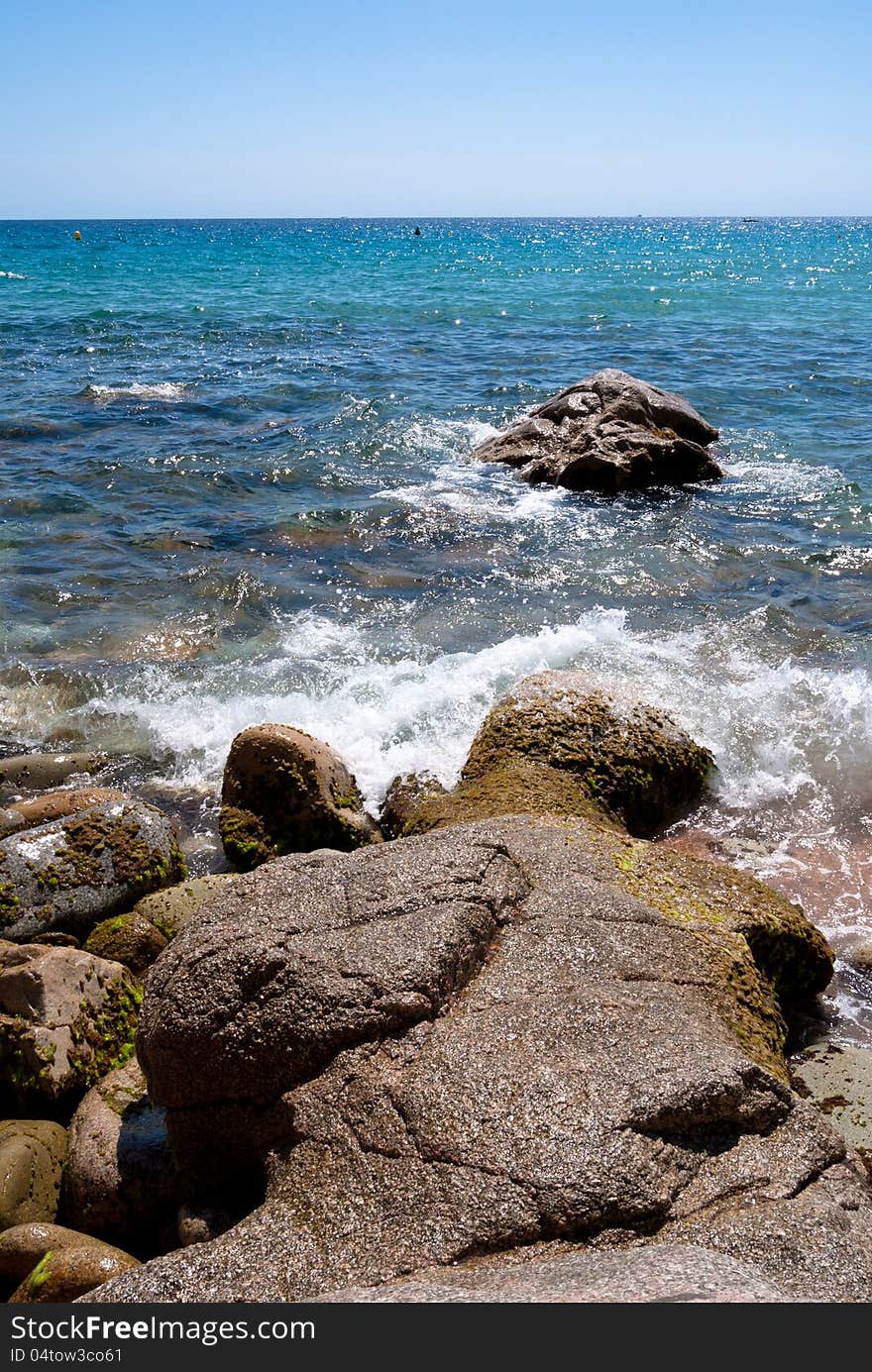 Sant Feliu Guixols. Sunny beach in Catalonia.