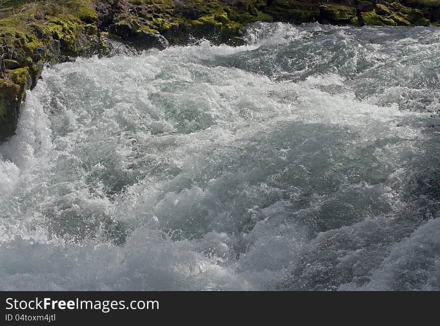 Closeup of the rough water in the river rapids.