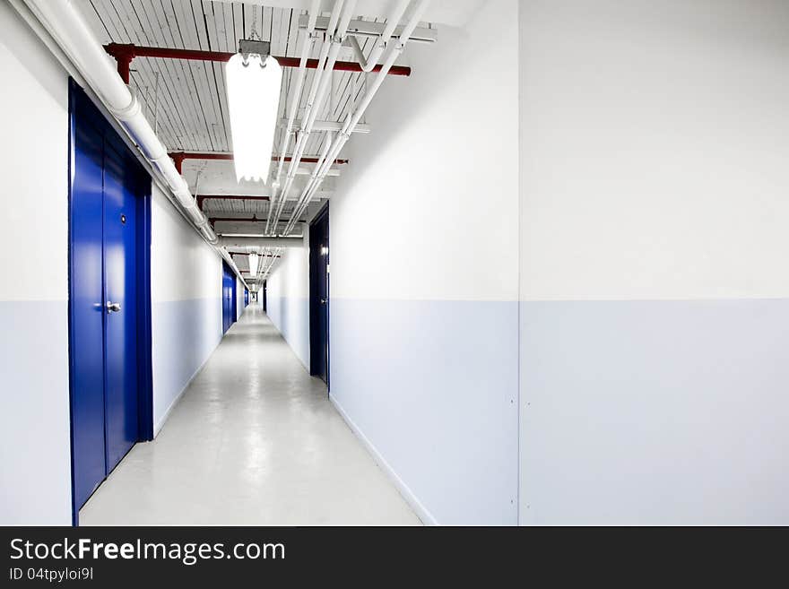 Long Blue Corridor in an underground place