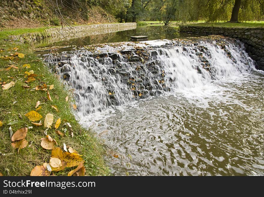 River weir in the fall. River weir in the fall