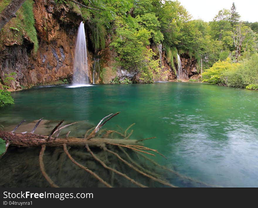 Waterfall in Plitvice national park croatia (southeast europe) during summer. The national park was founded in 1949 and is situated in the mountainous karst area of central Croatia, at the border to Bosnia and Herzegovina. Waterfall in Plitvice national park croatia (southeast europe) during summer. The national park was founded in 1949 and is situated in the mountainous karst area of central Croatia, at the border to Bosnia and Herzegovina.